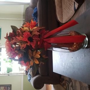 a fake fall style of a bluquet of flowers